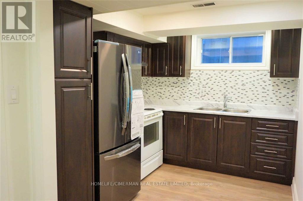 Lower #b - 22 Otonabee Avenue, Toronto, Ontario  M2M 2S3 - Photo 2 - C12470404