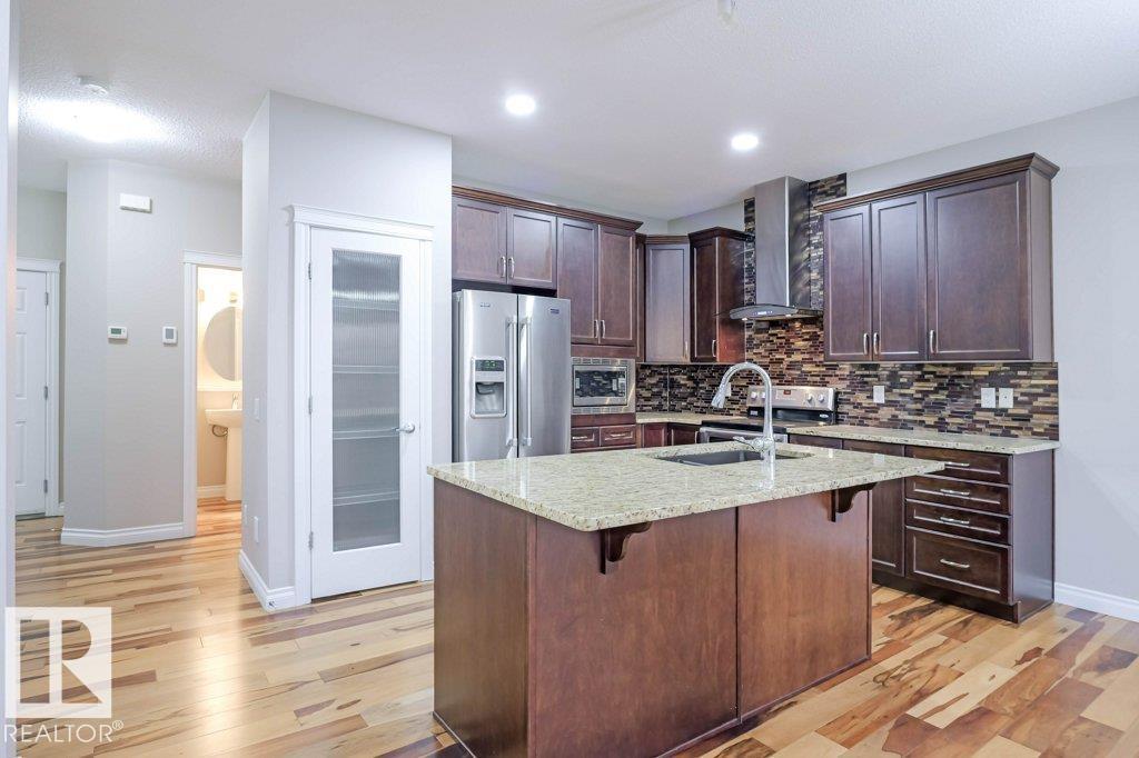 7913 Erasmus Cr Nw, Edmonton, Alberta  T6M 0S3 - Photo 13 - E4462712