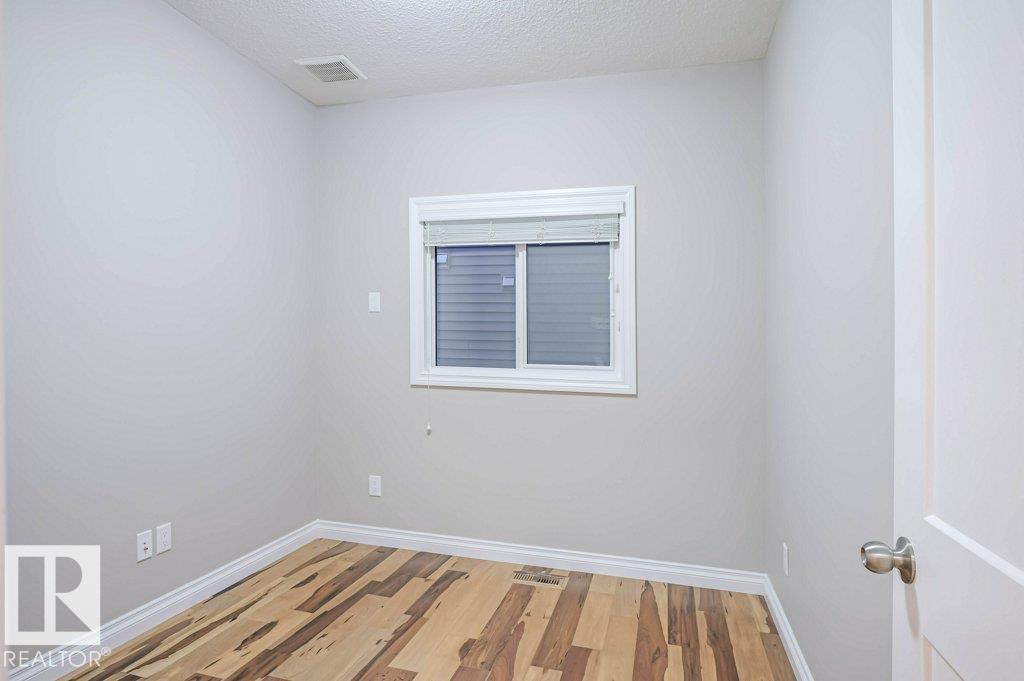7913 Erasmus Cr Nw, Edmonton, Alberta  T6M 0S3 - Photo 18 - E4462712