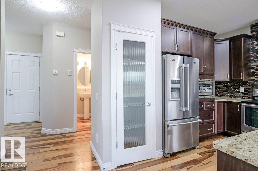 7913 Erasmus Cr Nw, Edmonton, Alberta  T6M 0S3 - Photo 8 - E4462712