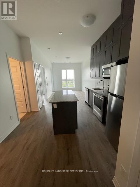 411 - 95 Dundas Street S, Oakville, Ontario  L6M 5N4 - Photo 11 - W12470510