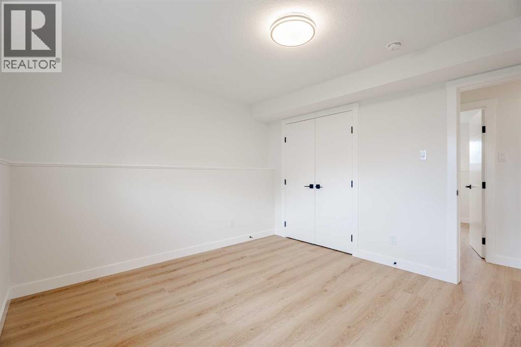 7020 Huntbourne Road Ne, Calgary, Alberta  T2K 3X7 - Photo 37 - A2262031