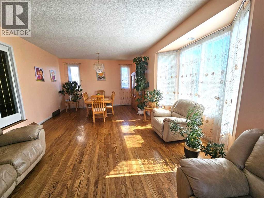 91 Woodbrook Road Sw, Calgary, Alberta  T2W 6C6 - Photo 9 - A2251631