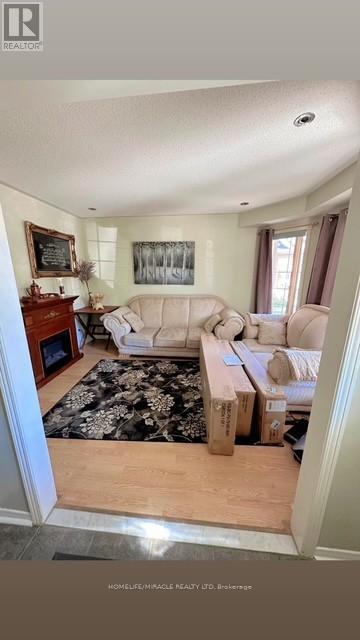 62 Heartleaf Crescent, Brampton, Ontario  L7A 2B7 - Photo 5 - W12470726