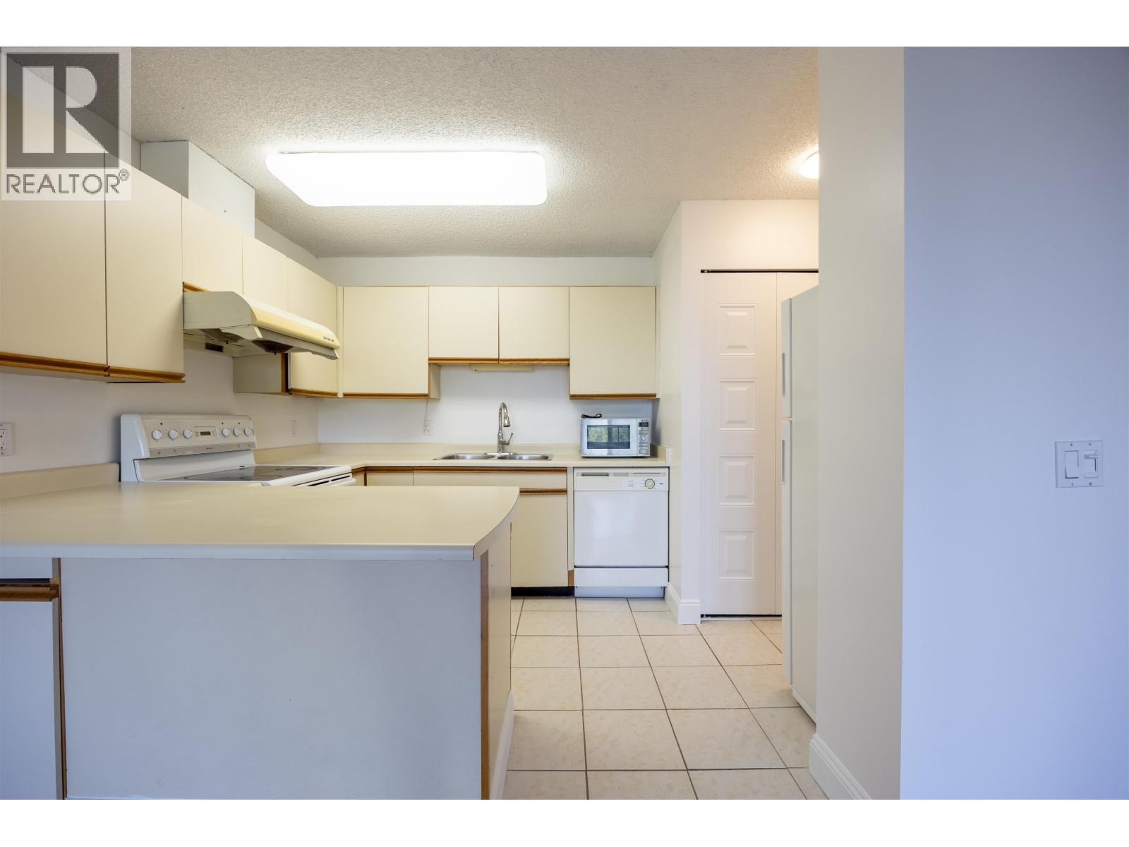 1005 3980 Carrigan Court, Burnaby, British Columbia  V3N 4S6 - Photo 9 - R3058271