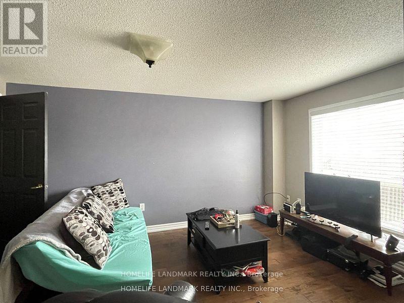 72 Dunsmore Lane, Barrie, Ontario  L4M 7A3 - Photo 3 - S12470783