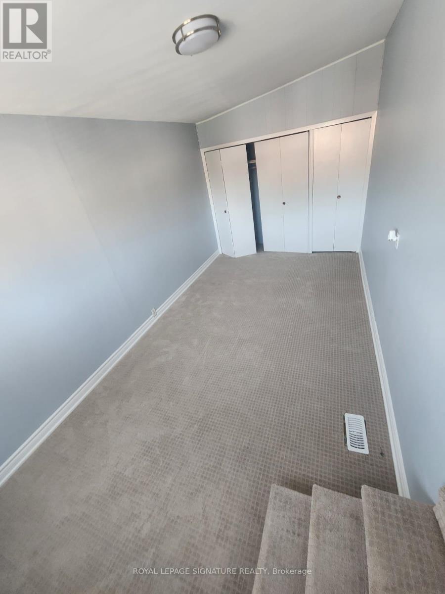23 Denison Avenue, Brampton, Ontario  L6X 1E8 - Photo 6 - W12446294
