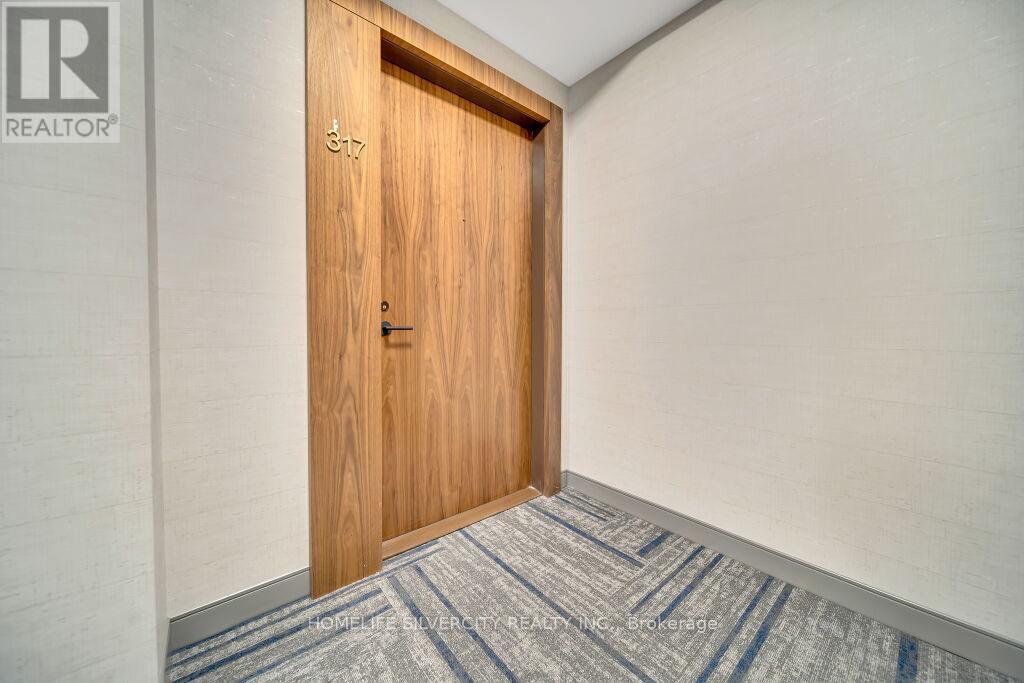 317 - 509 Dundas Street W, Oakville, Ontario  L6M 4M2 - Photo 5 - W12470822