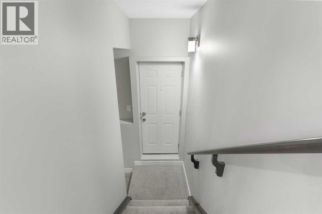 97 Amblehurst Gardens Nw, Calgary, Alberta  T3P 1Z9 - Photo 5 - A2263714