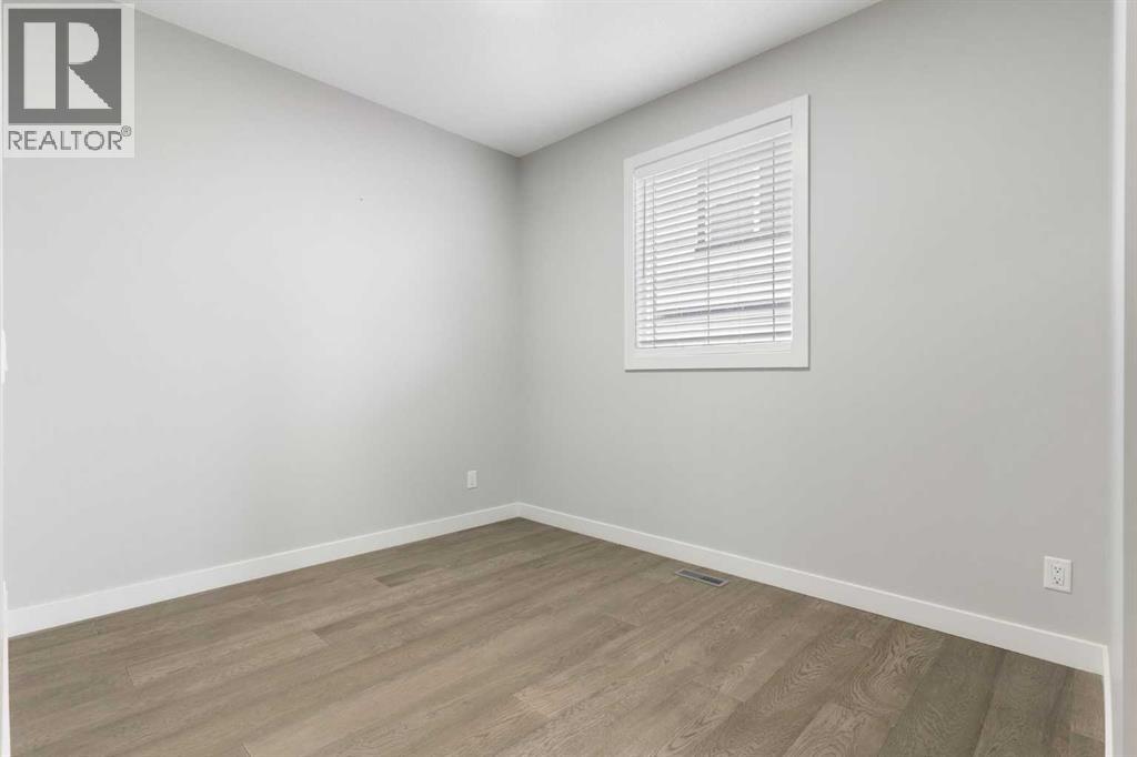 97 Amblehurst Gardens Nw, Calgary, Alberta  T3P 1Z9 - Photo 8 - A2263714