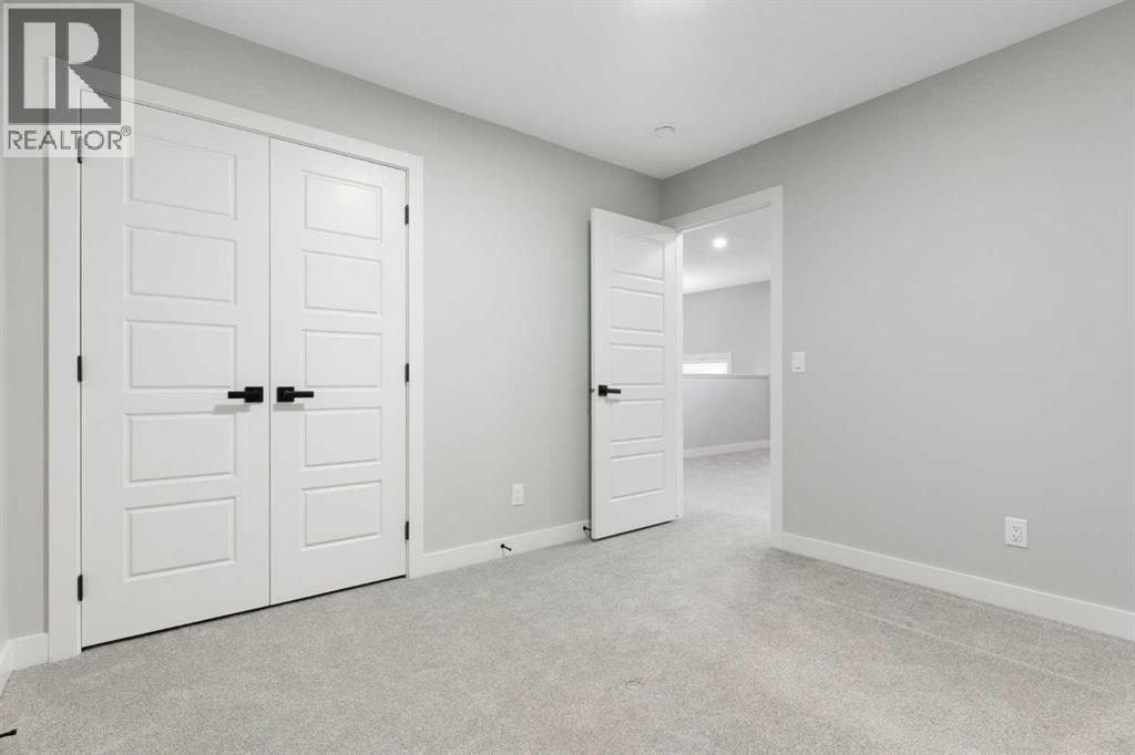 97 Amblehurst Gardens Nw, Calgary, Alberta  T3P 1Z9 - Photo 41 - A2263714