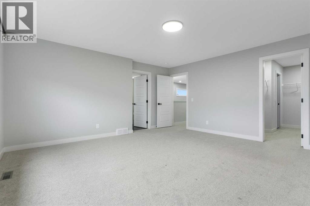 97 Amblehurst Gardens Nw, Calgary, Alberta  T3P 1Z9 - Photo 28 - A2263714
