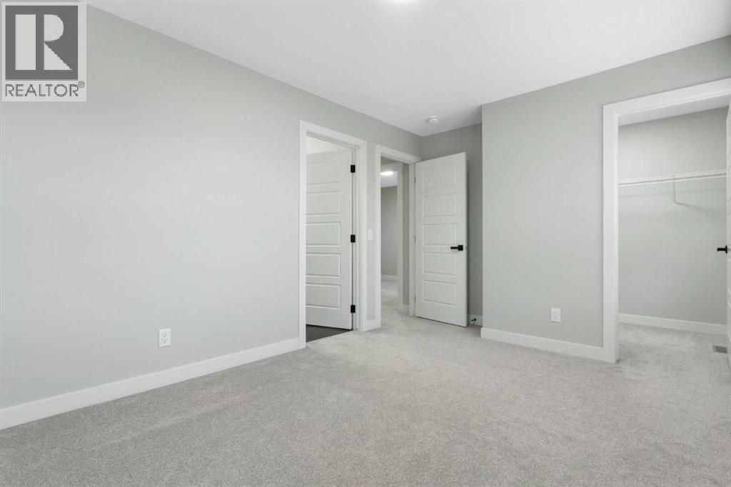 97 Amblehurst Gardens Nw, Calgary, Alberta  T3P 1Z9 - Photo 37 - A2263714