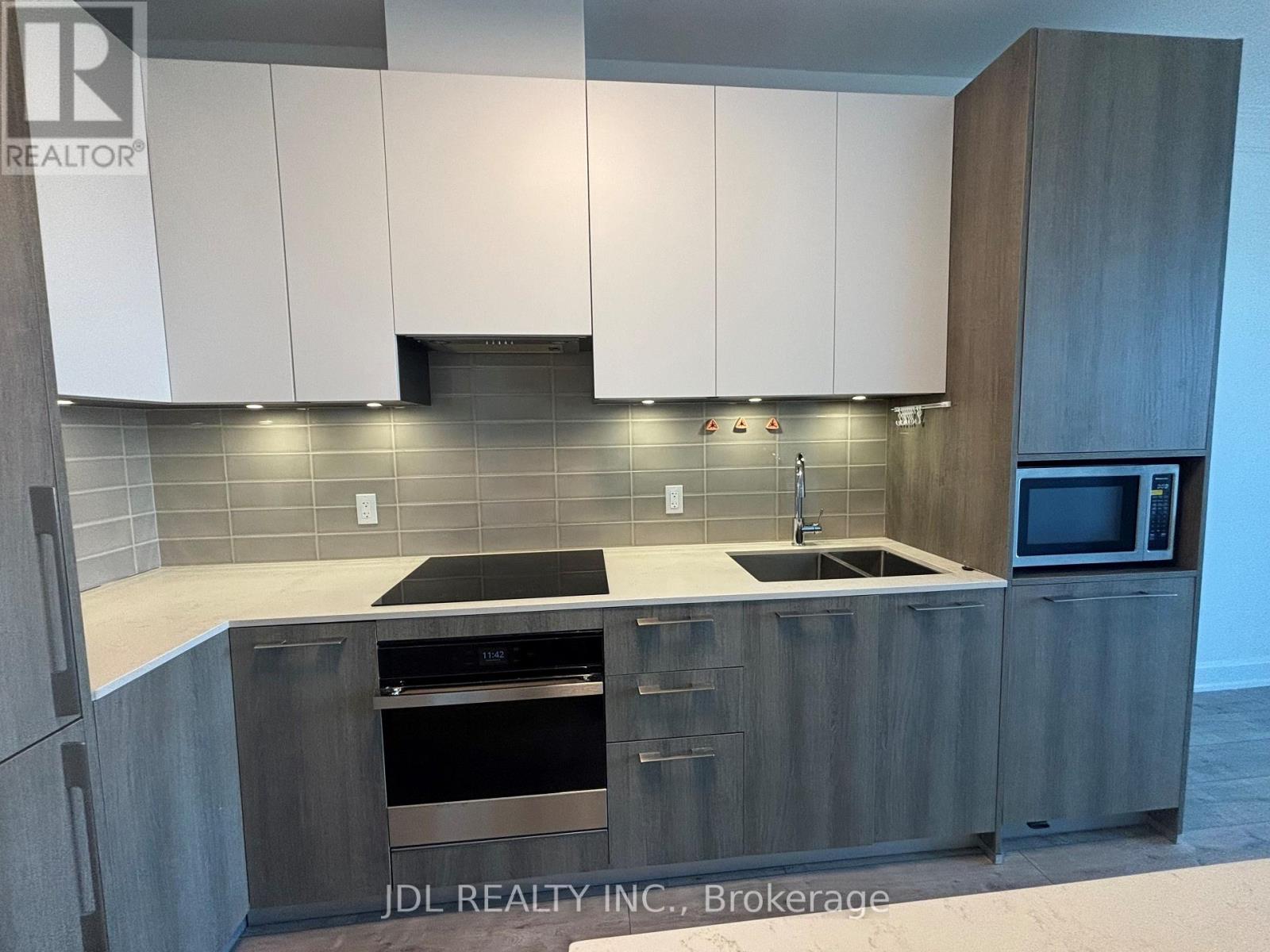 911 - 38 Water Walk Drive, Markham, Ontario  L3R 6M8 - Photo 6 - N12470866