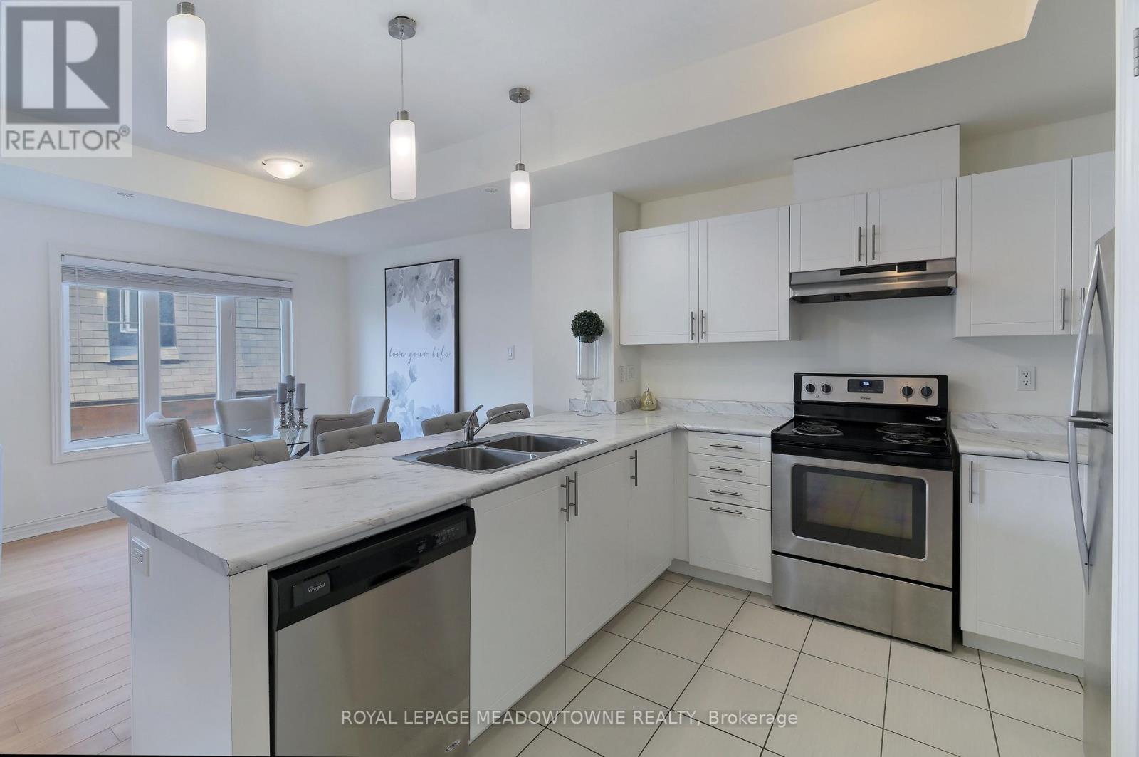 1704 - 2420 Baronwood Drive, Oakville, Ontario  L6M 0J7 - Photo 6 - W12470957