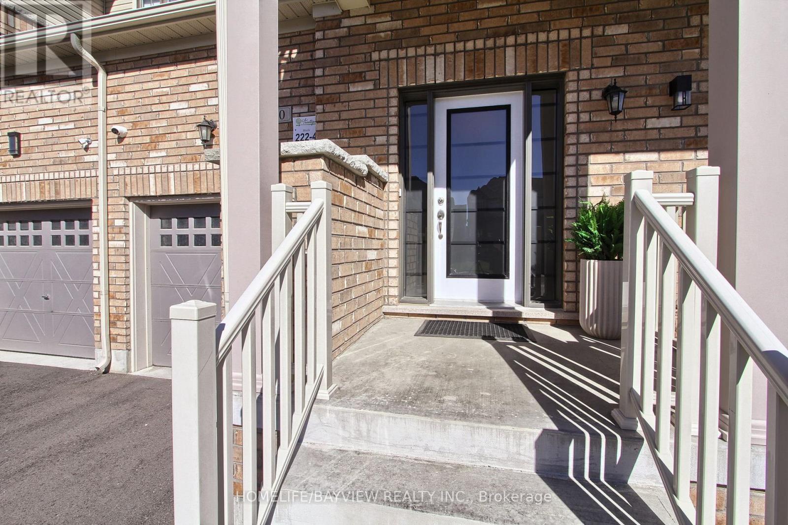 70 Lorne Thomas Place, New Tecumseth, Ontario  L9R 0V8 - Photo 3 - N12471089