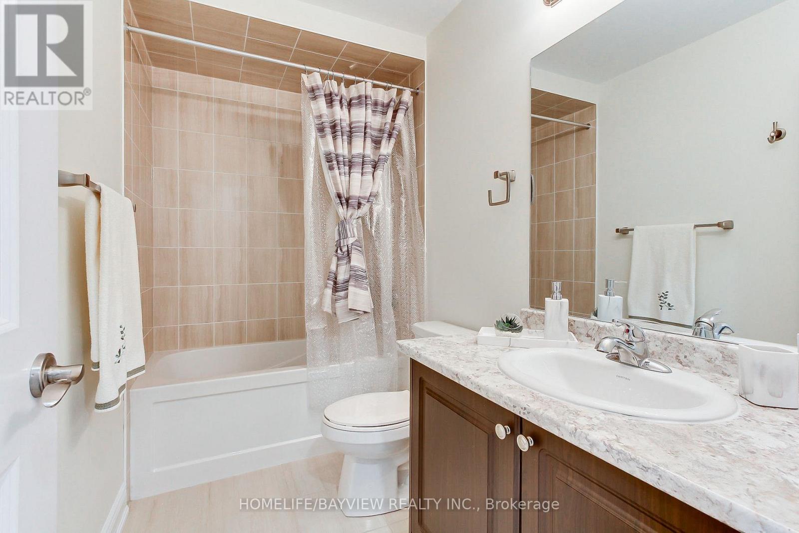 70 Lorne Thomas Place, New Tecumseth, Ontario  L9R 0V8 - Photo 32 - N12471089