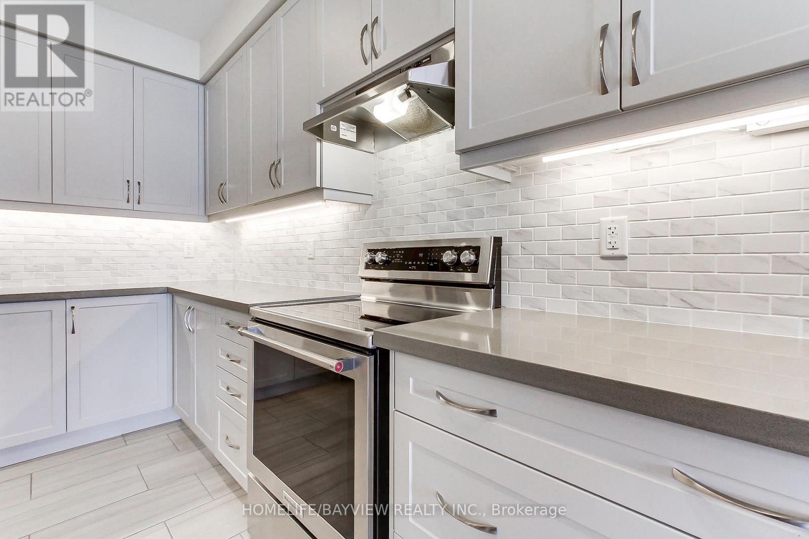 70 Lorne Thomas Place, New Tecumseth, Ontario  L9R 0V8 - Photo 9 - N12471089