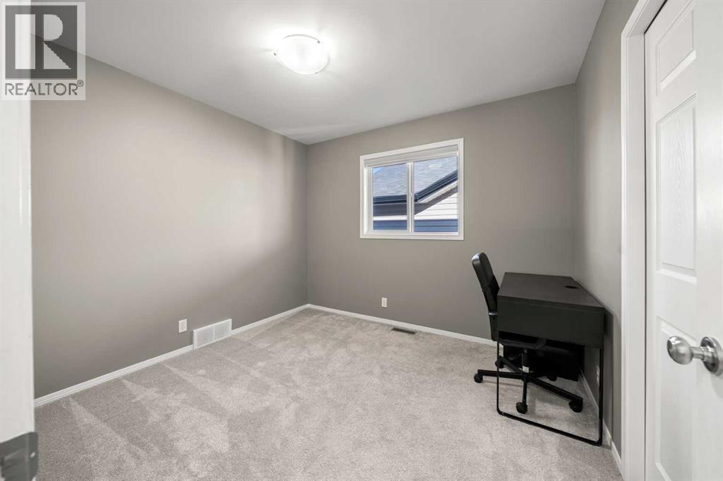 1038 Bridlemeadows Manor Sw, Calgary, Alberta  T2Y 4K9 - Photo 18 - A2264241