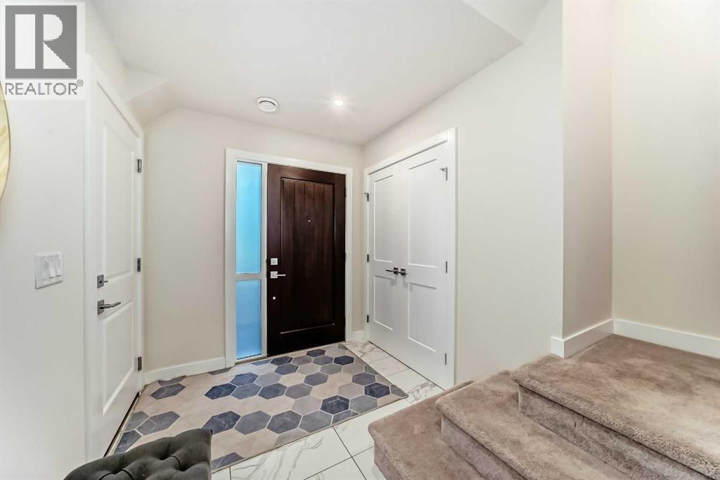 909 Crestridge Common Sw, Calgary, Alberta  T3B 6L6 - Photo 4 - A2264890