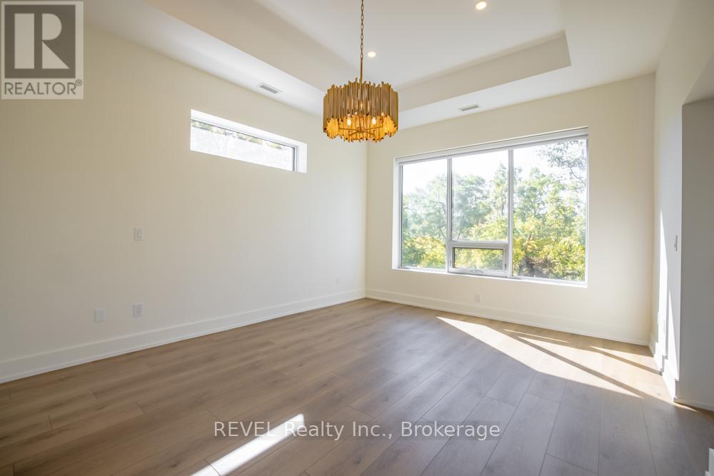 405 - 77 Yates Street, St. Catharines, Ontario  L2R 5R7 - Photo 12 - X12471534