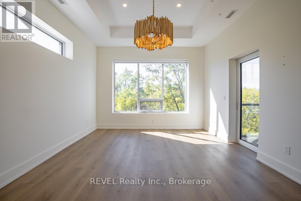 405 - 77 Yates Street, St. Catharines, Ontario  L2R 5R7 - Photo 13 - X12471534