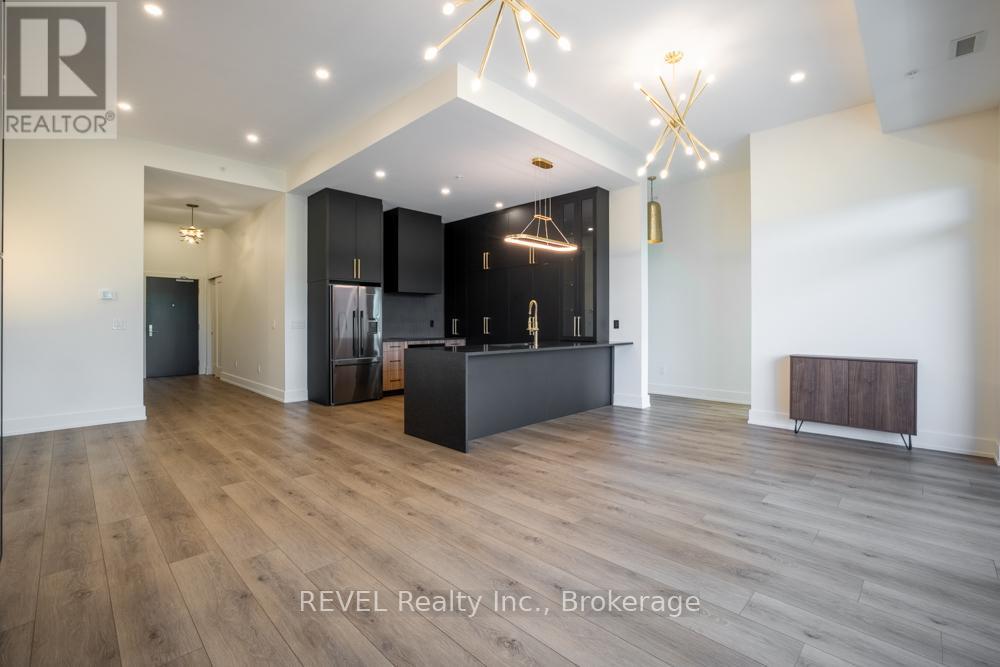 405 - 77 Yates Street, St. Catharines, Ontario  L2R 5R7 - Photo 5 - X12471534