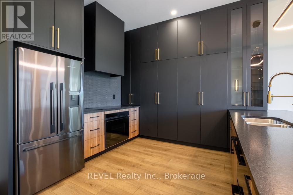 405 - 77 Yates Street, St. Catharines, Ontario  L2R 5R7 - Photo 7 - X12471534