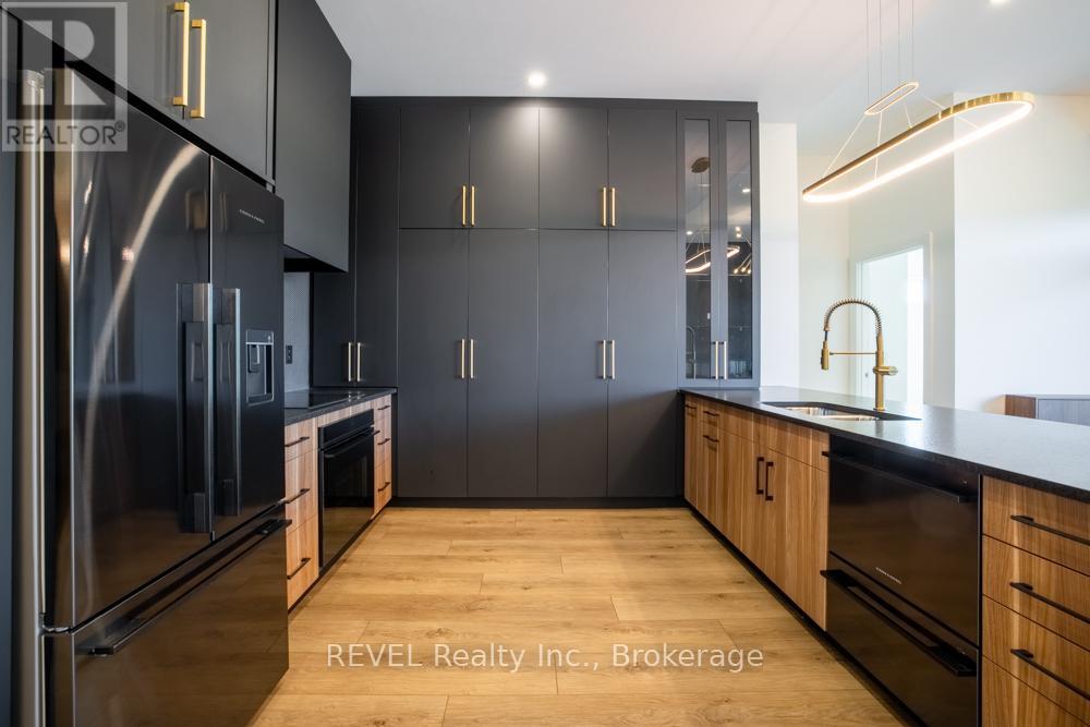 405 - 77 Yates Street, St. Catharines, Ontario  L2R 5R7 - Photo 8 - X12471534