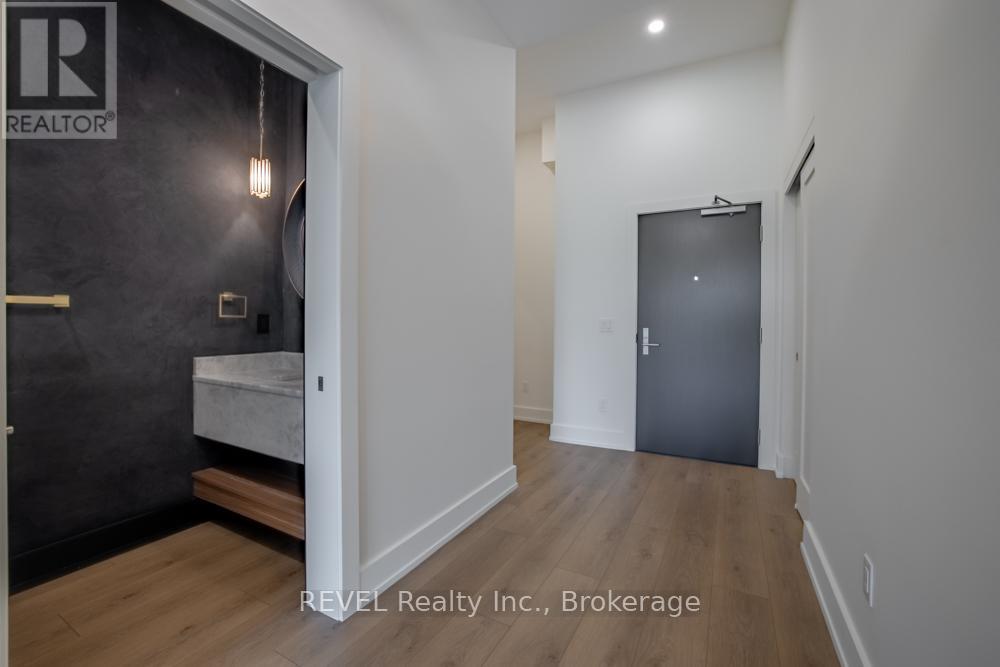 405 - 77 Yates Street, St. Catharines, Ontario  L2R 5R7 - Photo 9 - X12471534