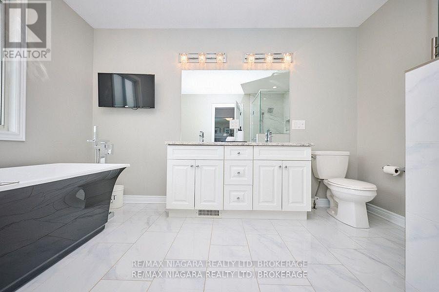 5703 Osprey Avenue, Niagara Falls (Forestview), Ontario  L2H 0M2 - Photo 21 - X12471618