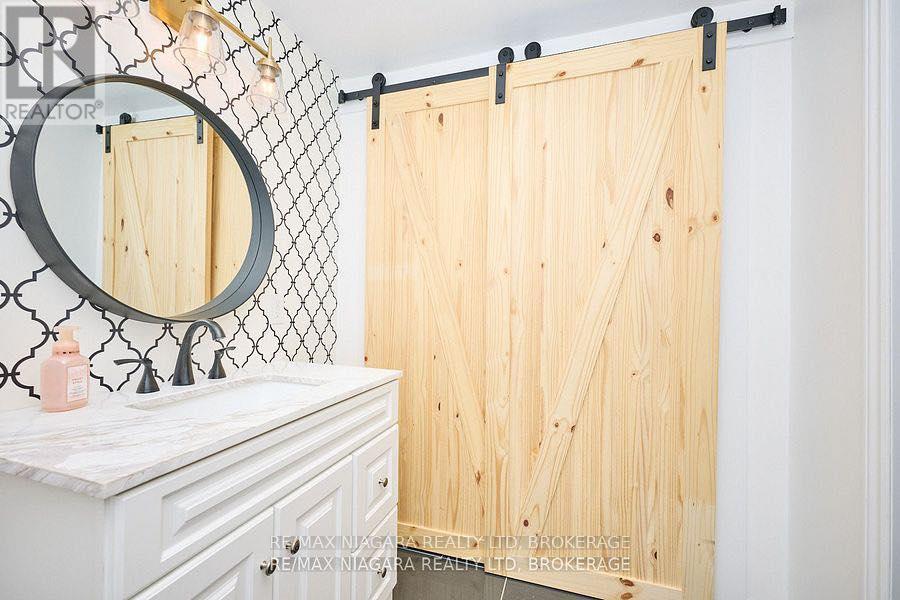 5703 Osprey Avenue, Niagara Falls (Forestview), Ontario  L2H 0M2 - Photo 38 - X12471618