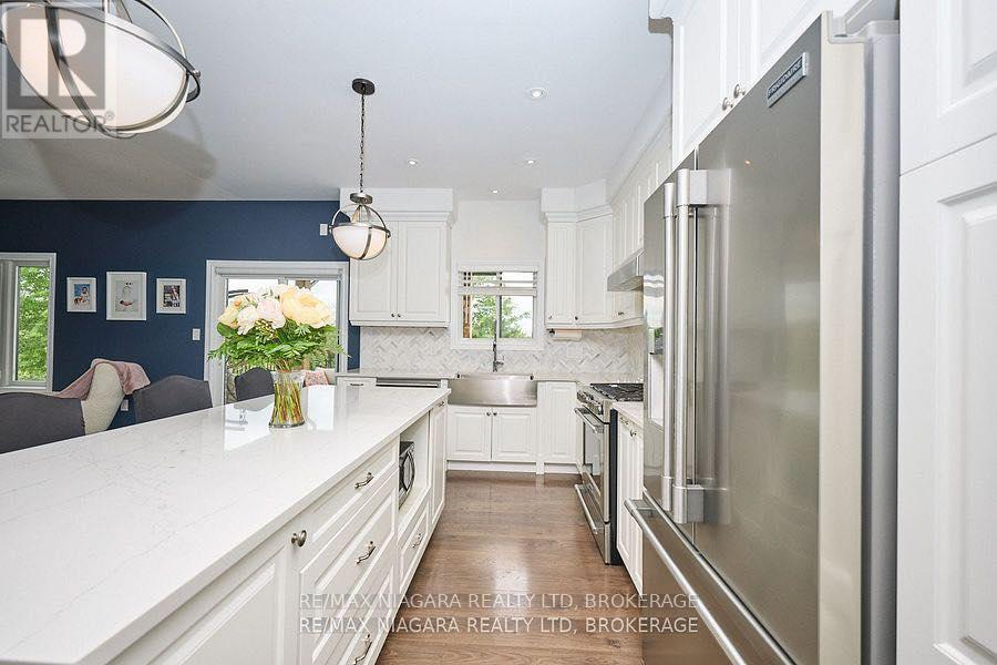 5703 Osprey Avenue, Niagara Falls (Forestview), Ontario  L2H 0M2 - Photo 8 - X12471618