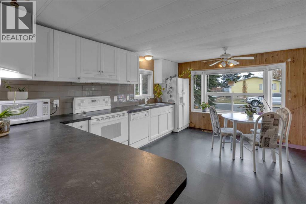 47 Huntstrom Drive Ne, Calgary, Alberta  T2K 5T4 - Photo 2 - A2264392