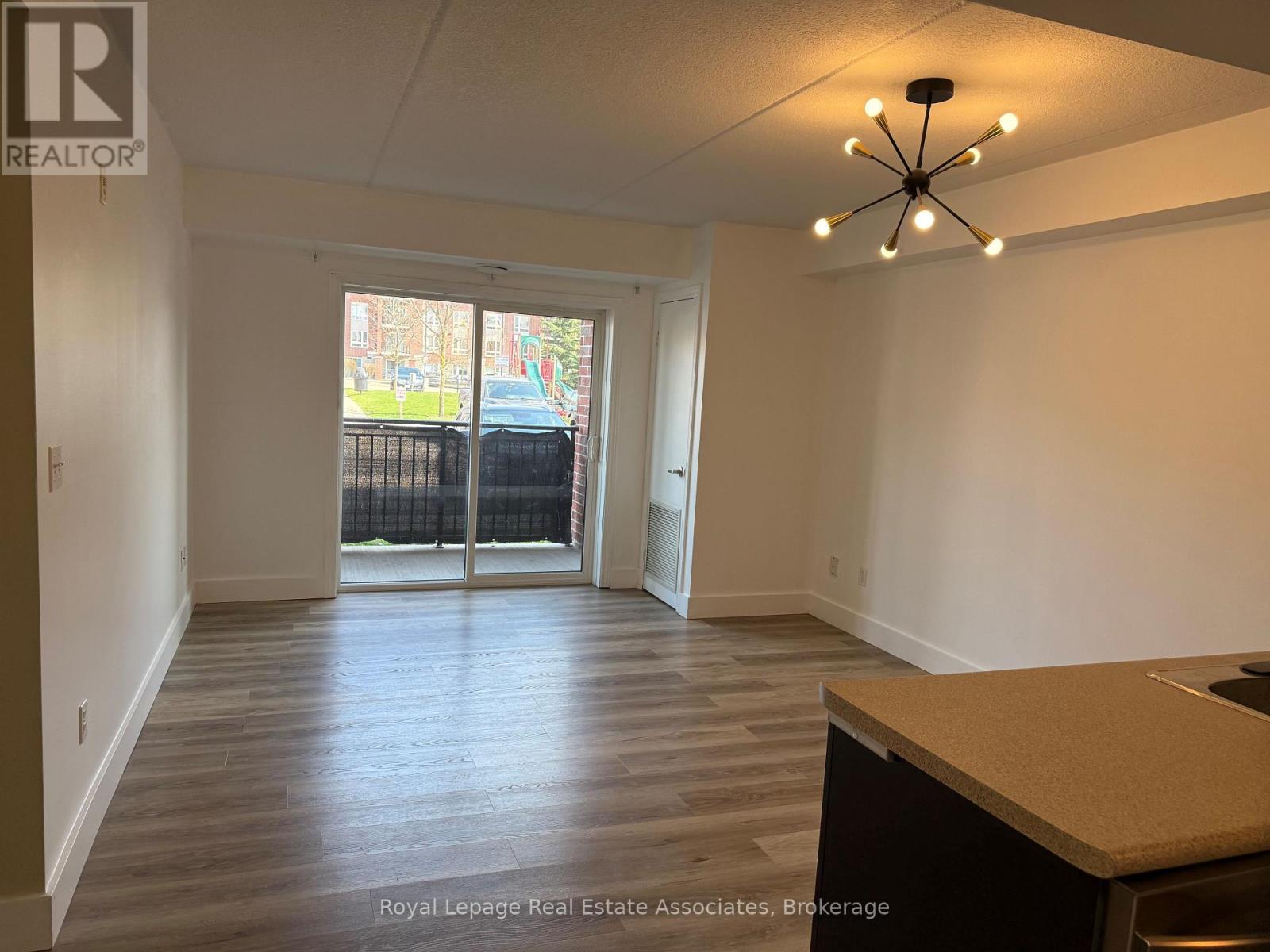 107 - 37 Goodwin Drive, Guelph, Ontario  N1L 0E6 - Photo 2 - X12471680