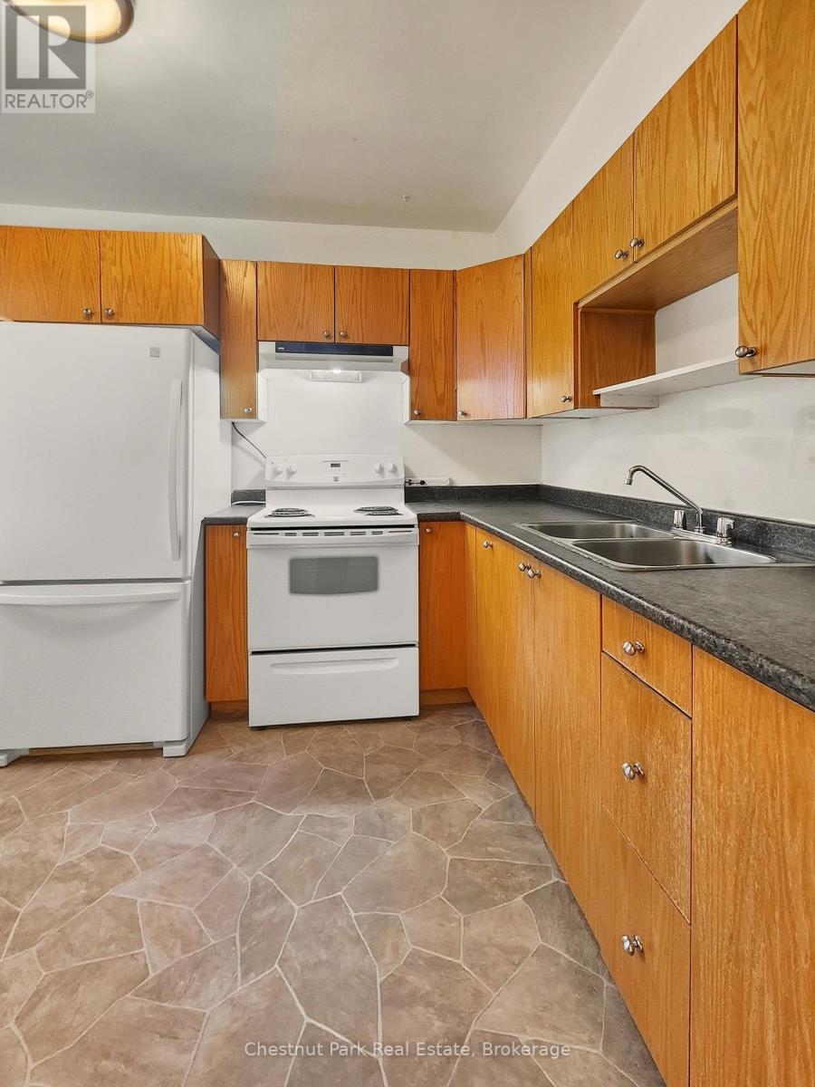 7 Clifford Avenue, North Bay (Ferris), Ontario  P1A 1N9 - Photo 8 - X12471856