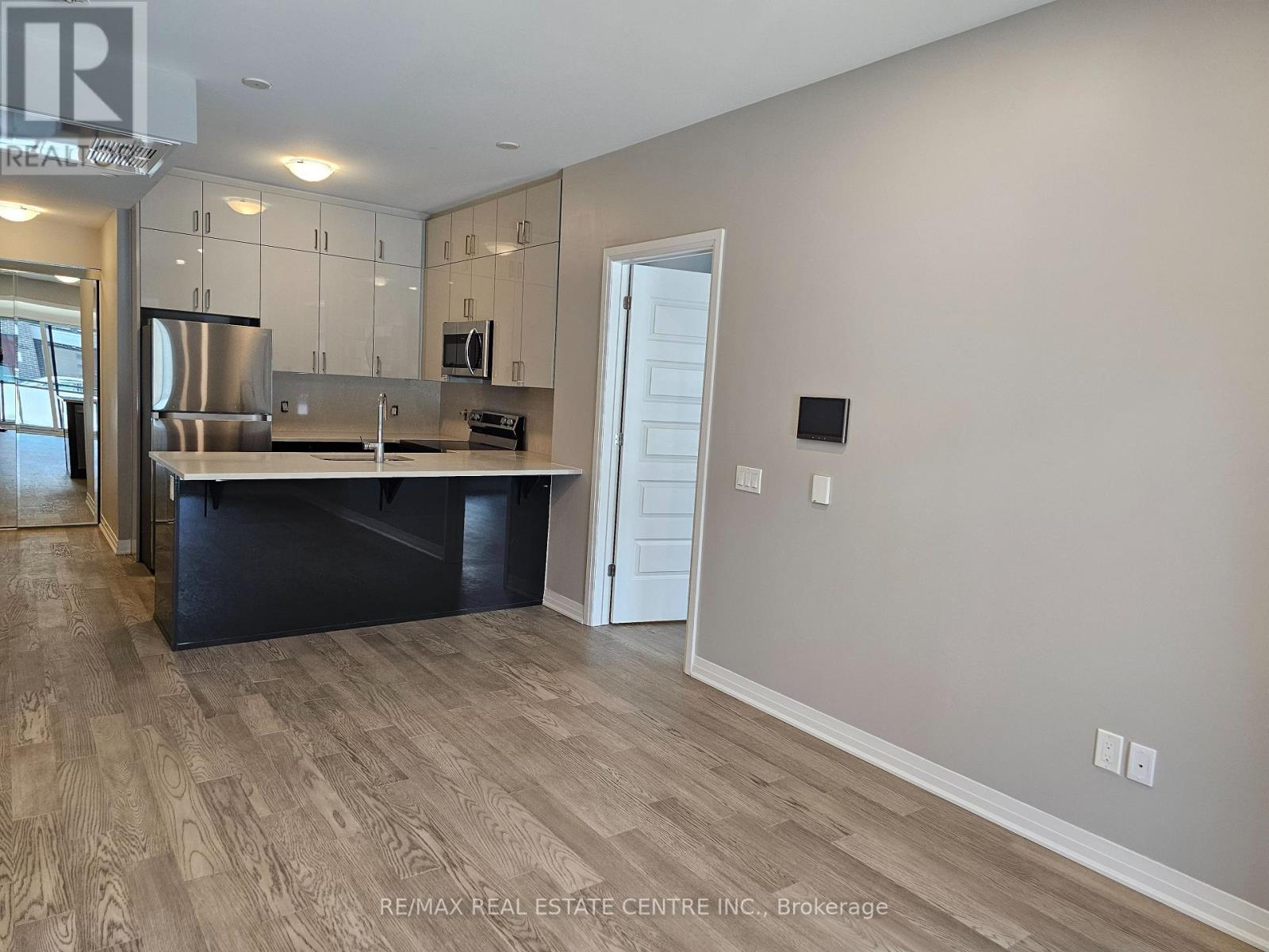 101 - 470 Gordon Krantz Avenue, Milton, Ontario  L9E 1Z3 - Photo 2 - W12471809