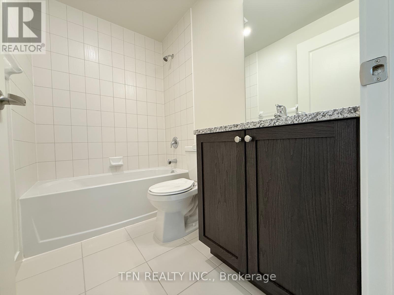 411 - 38 Annie Craig Drive, Toronto, Ontario  M8V 0G9 - Photo 6 - W12428134