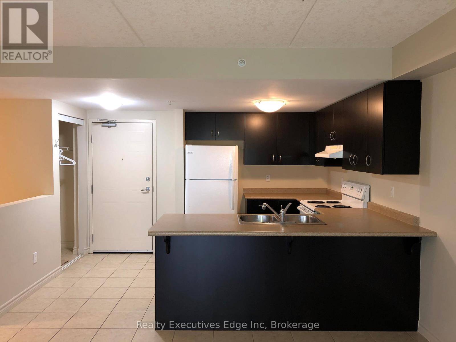 212 - 39 Goodwin Drive, Guelph, Ontario  N1L 0E5 - Photo 4 - X12472273