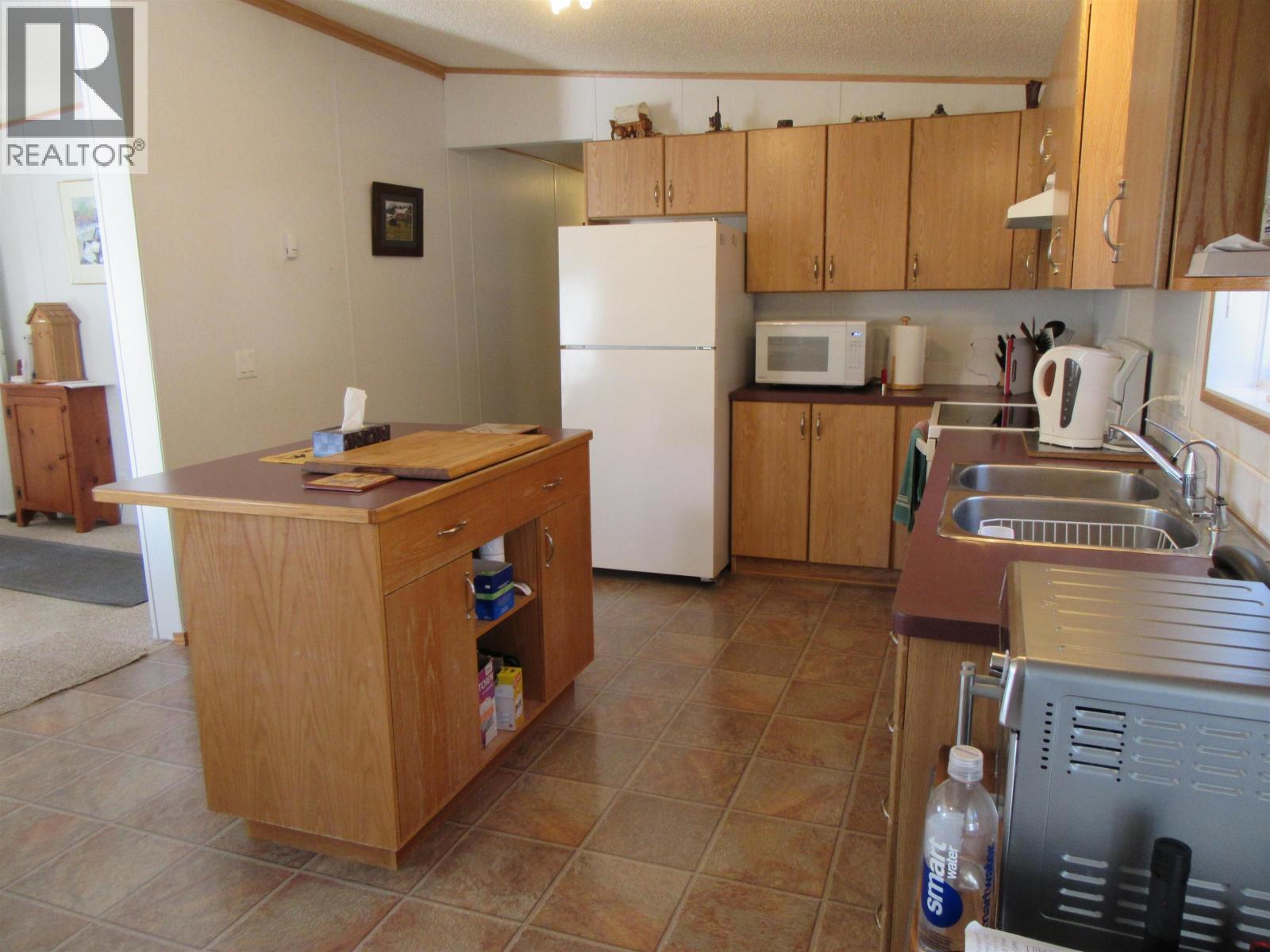 4866 Kemmi Crescent, 108 Mile Ranch, British Columbia  V0K 2Z0 - Photo 19 - R3059996