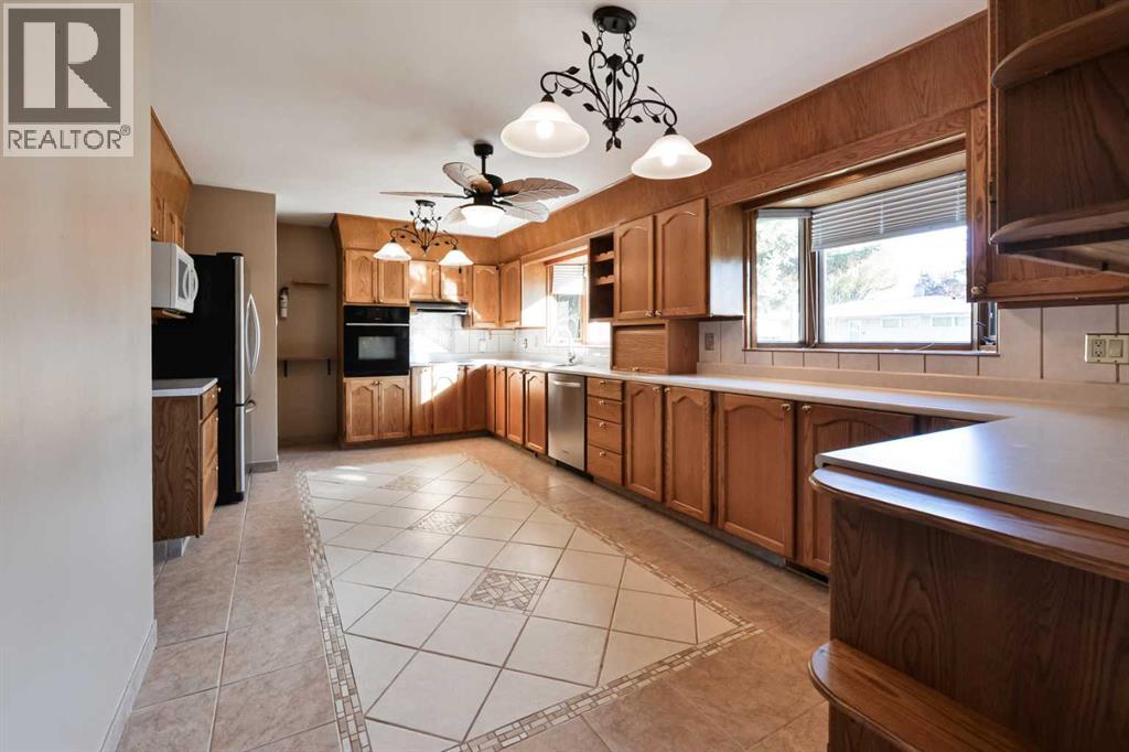 87 Gladeview Crescent Sw, Calgary, Alberta  T3E 4X9 - Photo 7 - A2264315
