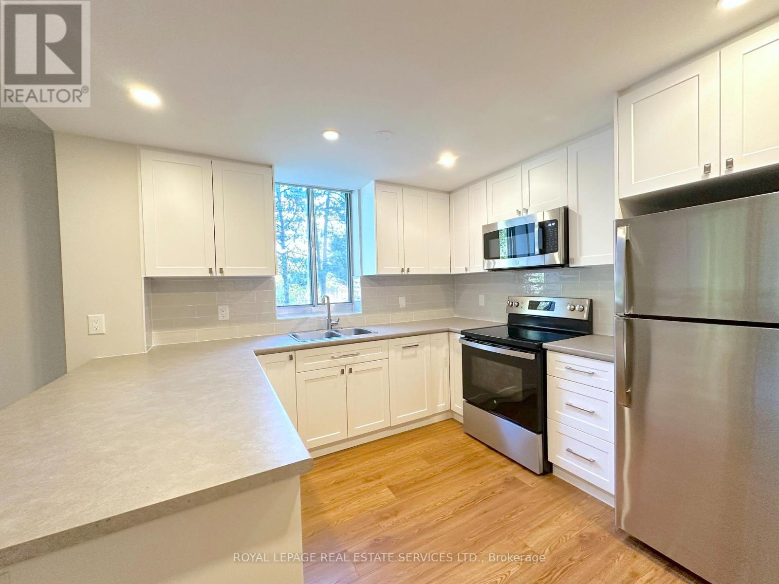 205 - 165 La Rose Avenue, Toronto, Ontario  M9P 3S9 - Photo 2 - W12472402