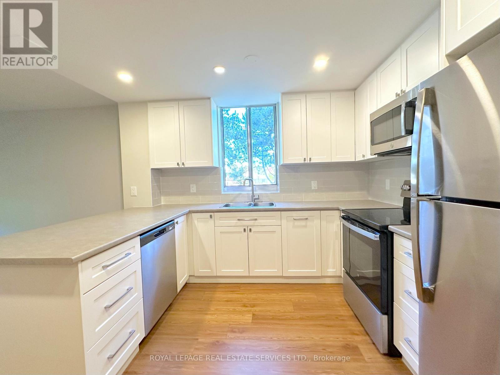 205 - 165 La Rose Avenue, Toronto, Ontario  M9P 3S9 - Photo 3 - W12472402