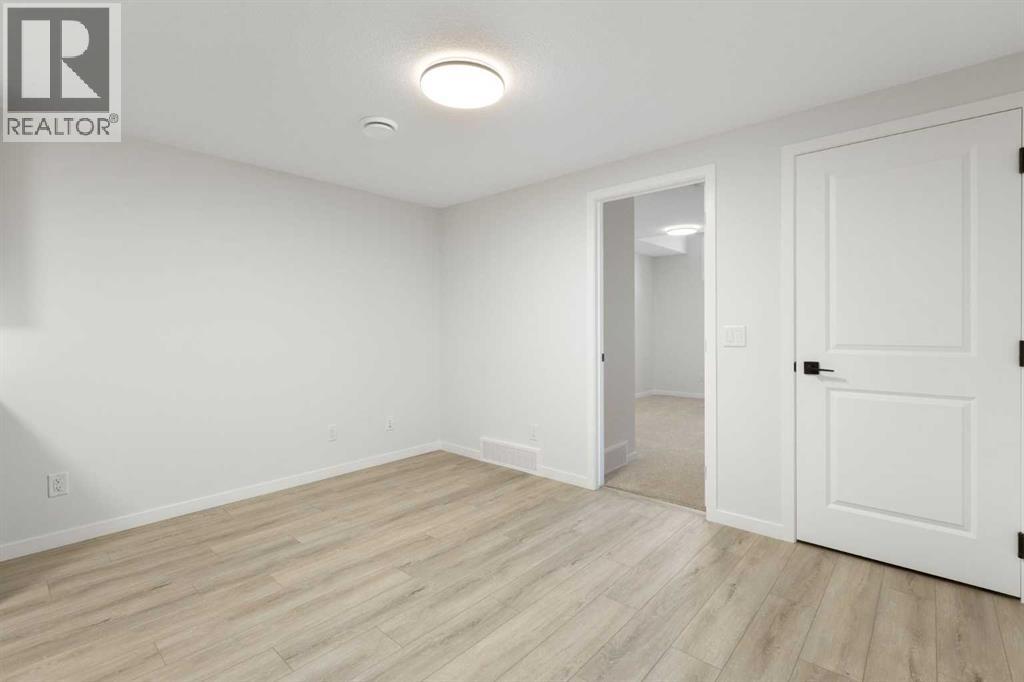 580 Rowmont Boulevard Nw, Calgary, Alberta  T3L 0L6 - Photo 40 - A2251634