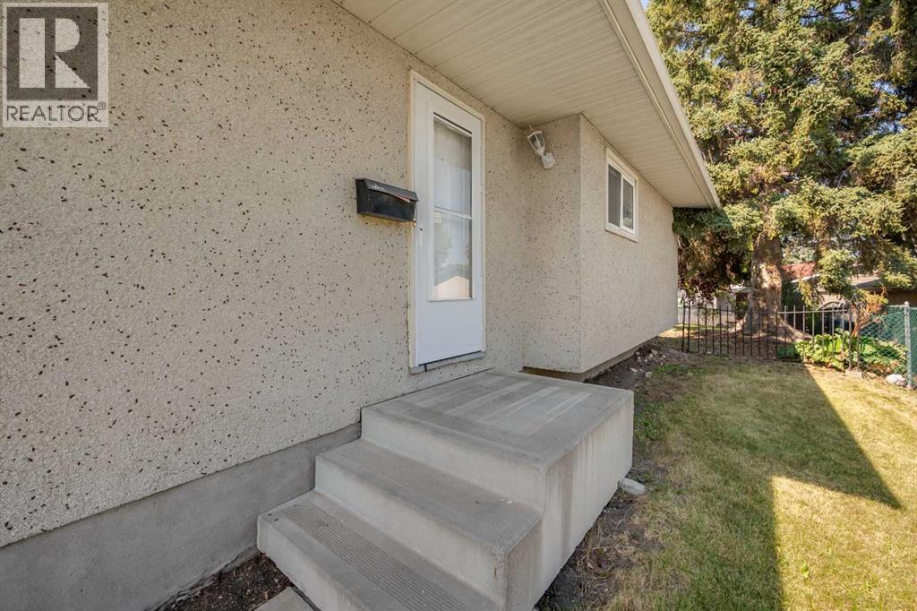 804 71 Avenue Nw, Calgary, Alberta  T2K 0N3 - Photo 5 - A2252343