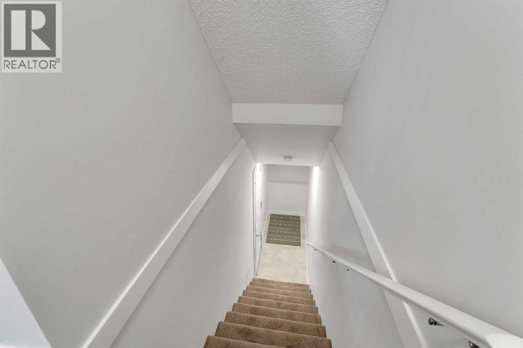 101, 1225 Kings Heights Way Se, Airdrie, Alberta  T4A 0E8 - Photo 23 - A2263294