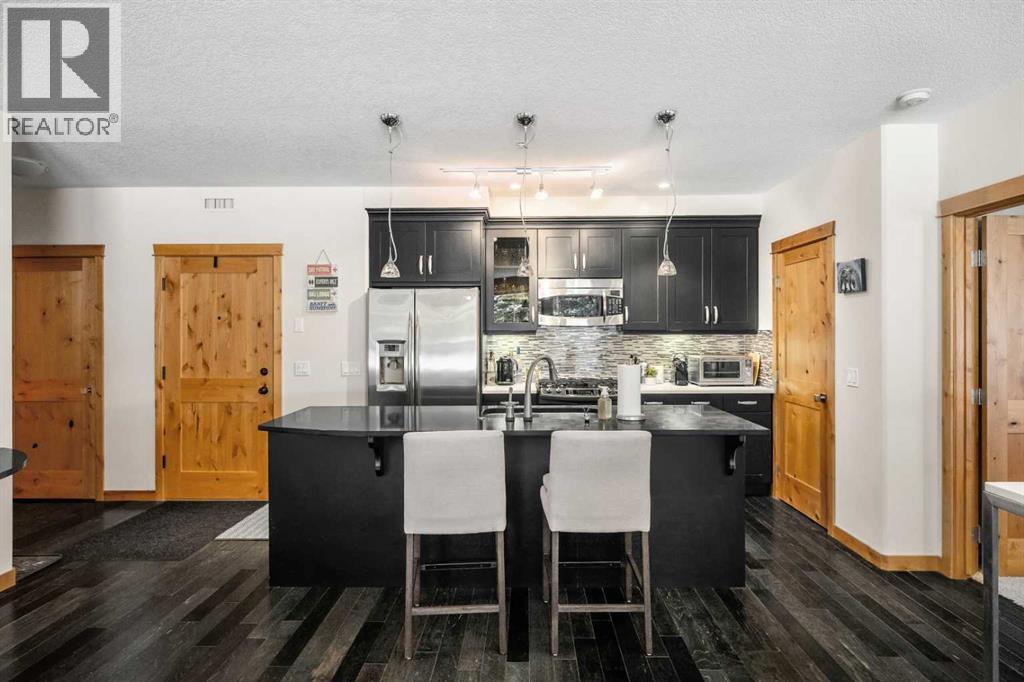 102, 2100a Stewart Creek Drive, Canmore, Alberta  T1W 0G3 - Photo 4 - A2265382
