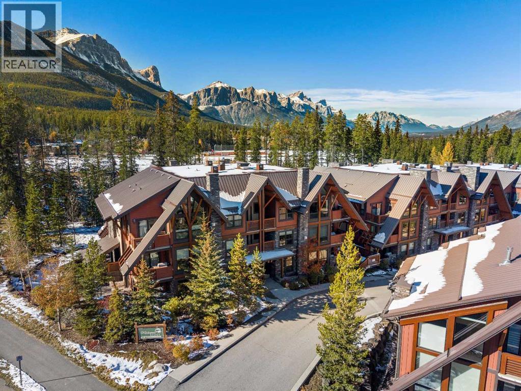 102, 2100a Stewart Creek Drive, Canmore, Alberta  T1W 0G3 - Photo 1 - A2265382