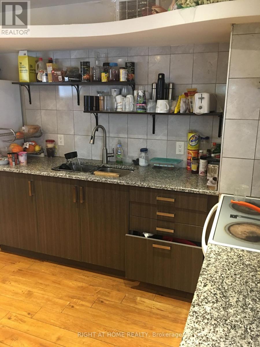 Lower - 12 Bolingbroke Road, Toronto, Ontario  M6B 3L6 - Photo 2 - W12472605