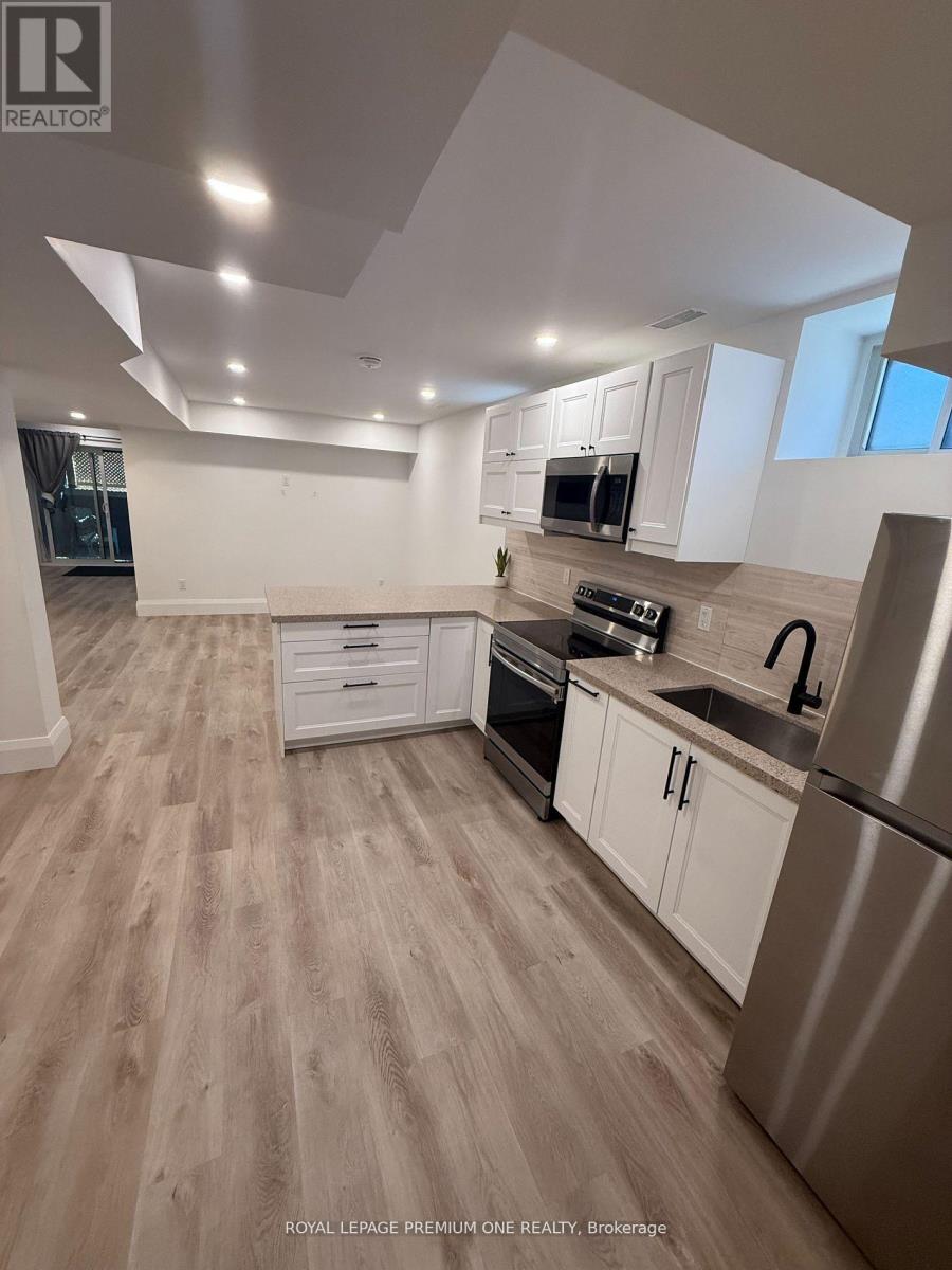 Lower Level W/walk-Out - 39 Lonborough Avenue, Toronto, Ontario  M6M 1X2 - Photo 9 - W12472624